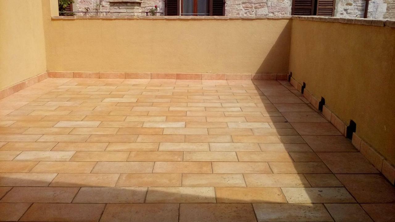 Casa Vacanze Gaia Asís Exterior foto